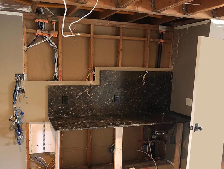 Seattle home water damage restoration and electrical repair - Town Construction and Development