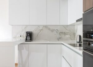 A white kitchen. An all-white kitchen is one of the outdated kitchen trends you should avoid for your home.