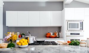 simple Edmonds kitchen white design with fruits on the counter